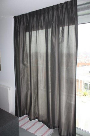 Gordijnen lichtglanzend grijs